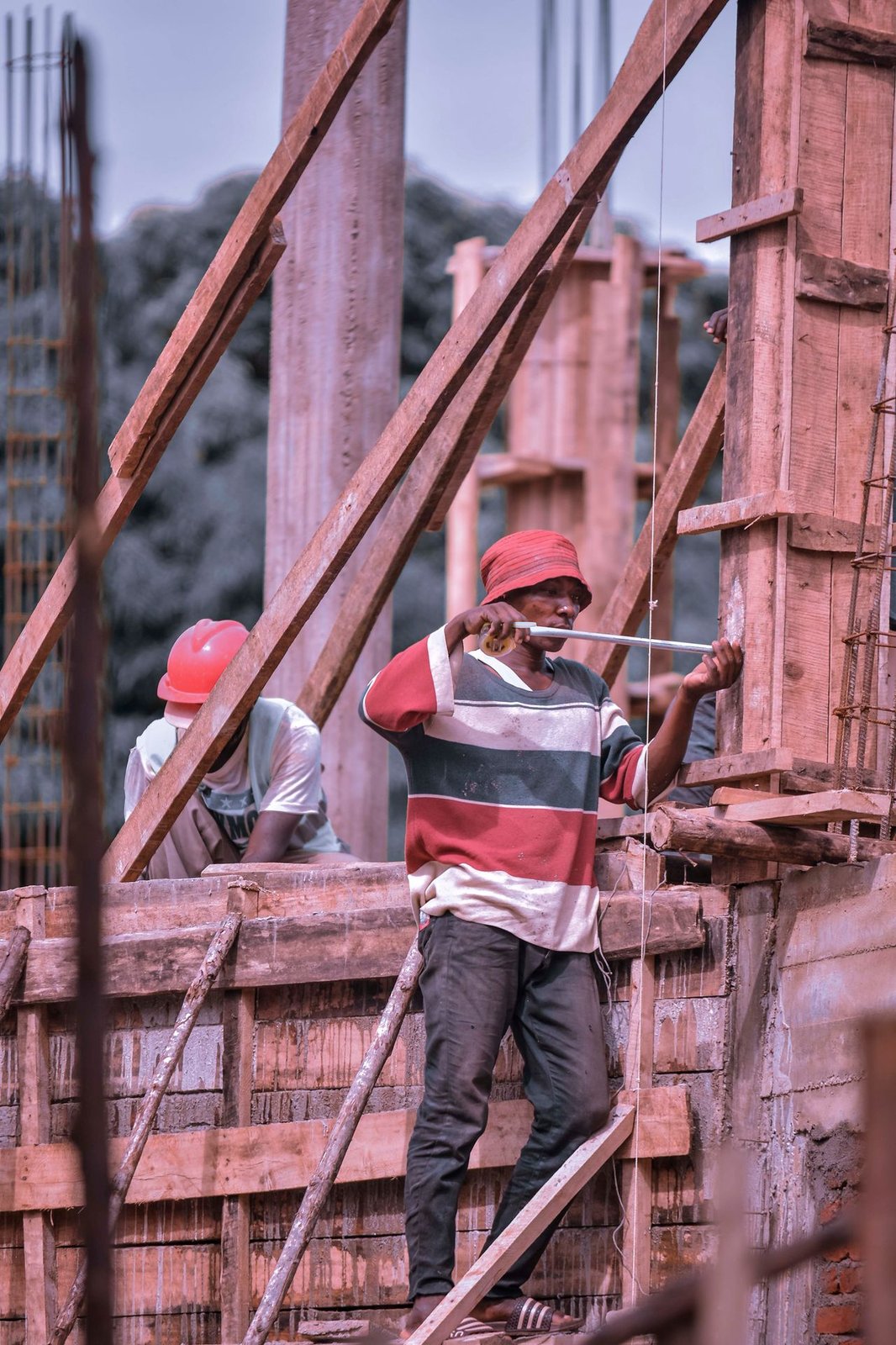Supplier SAQ Management - Image shows a worker working with metal